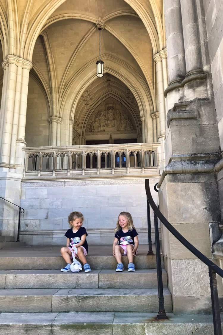 Sitting on the steps of the National Cathedral - things to do in Washington DC