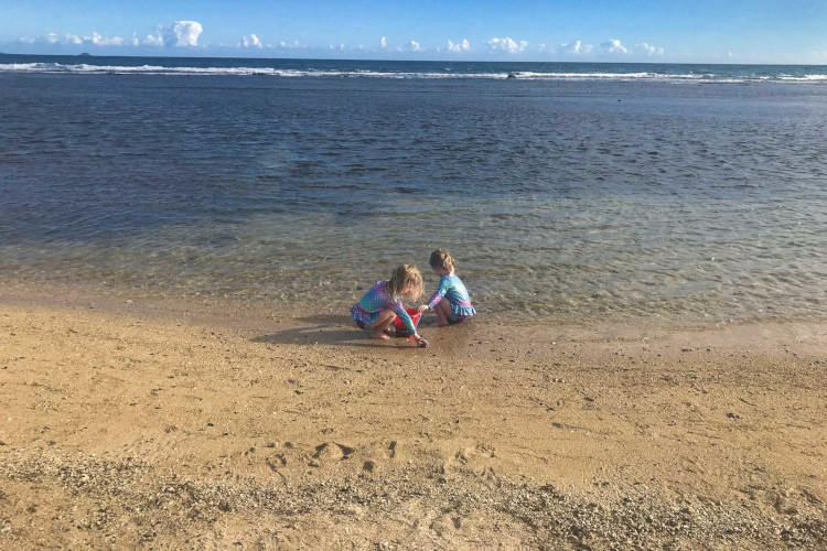 Playing on the beach near Ponce, Puerto Rico