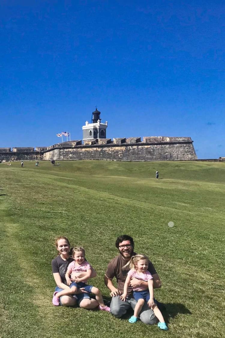 Playing on the lawn near El Morro is a fun thing to do in Puerto Rico for kids