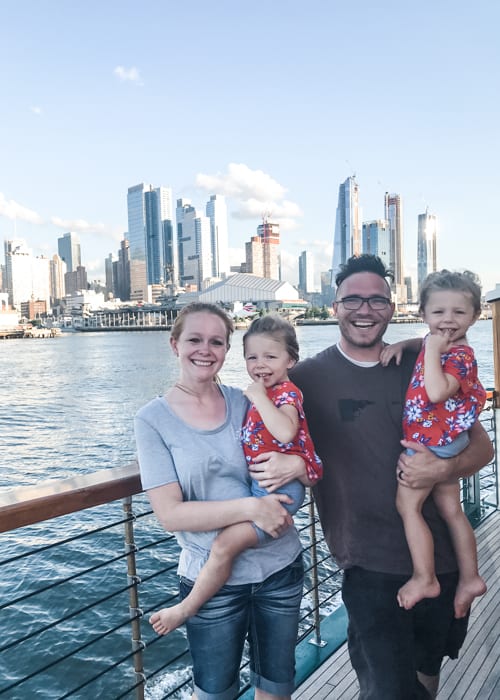 Parents in New York City skyline with kids