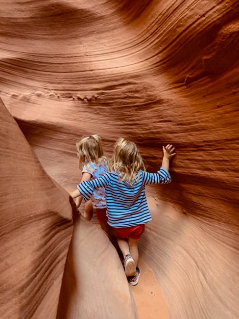 Two young participating in the Lower Antelope Canyon tours