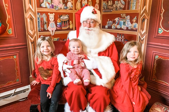 Children visiting Santa at the Village at Meridian in Idaho is one of the fun things to do in Boise in the winter.