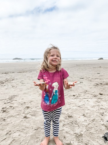 Collecting shells at Arcadia Beach