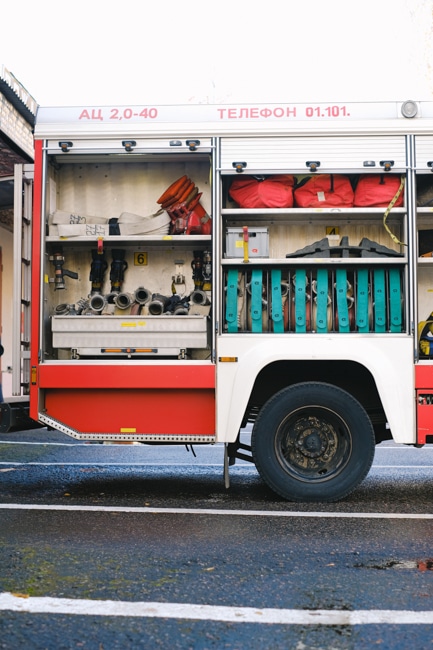 a picture of a fire truck and its supplies that kids will learn about at the Denver Firefighter Museum.