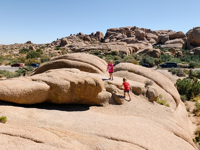 Climbing the rocks in Joshua Tree National Park in California