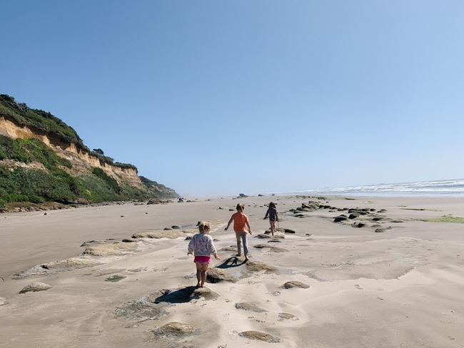 It is fun to play on the beach during an Oregon Coast day trip from Portland