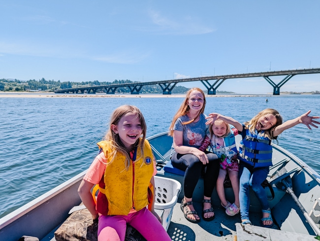 Family enjoying crabbing in Waldport, Oregon