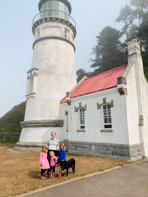 Family visiting the lighthouse in Florence, Oregon