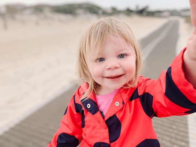 Toddler on the beach in Anastasia State Park in St. Augustine, Florida