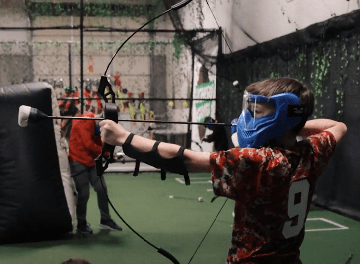 A Picture of kids shooting bows a the Archery Games Denver.