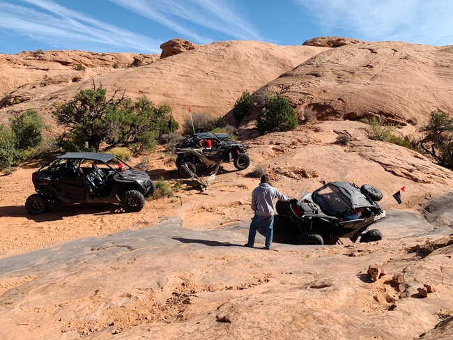 Rzr tipped over on the Poison Spider Trail