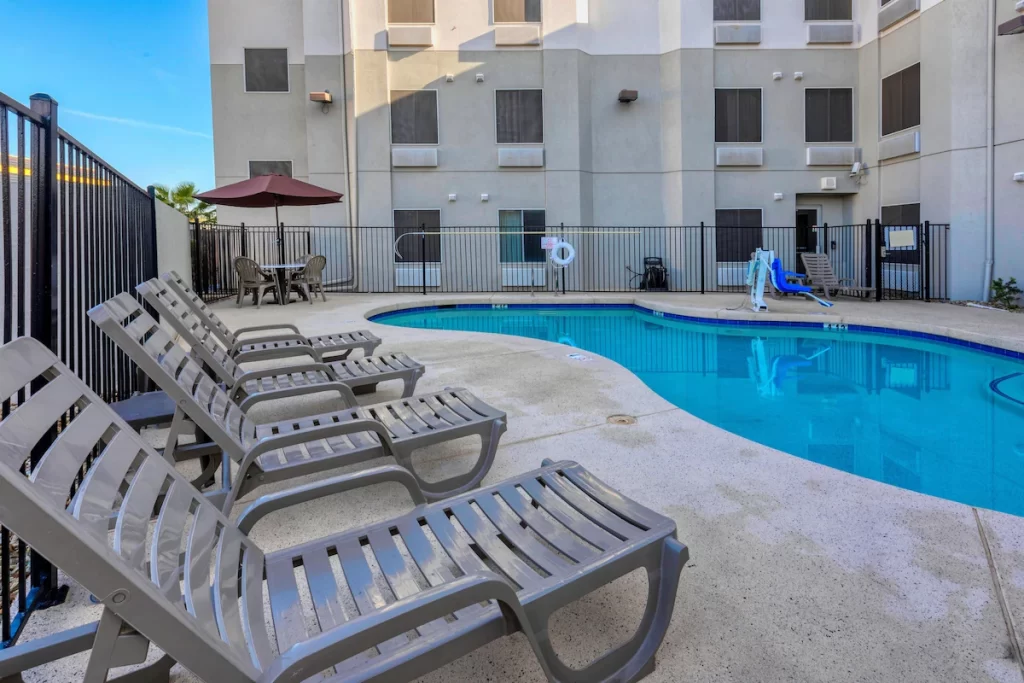 Swimming pool at the SureStay Plus Hotel