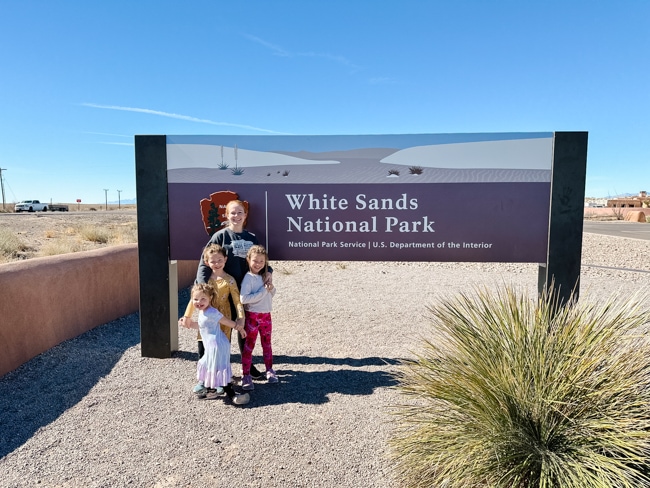 My family at the White Sands National Park entrance sign