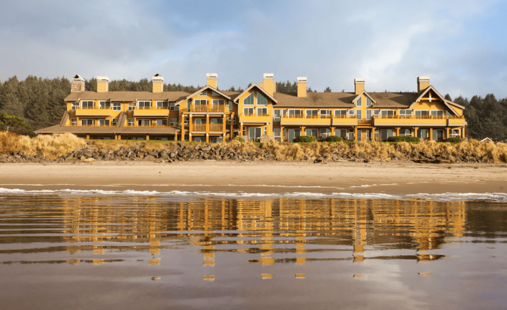 The outside of The Ocean Lodge, from the water's edge.
