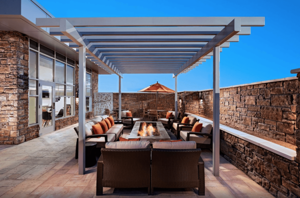 Patio area and fire pit at Hyatt House Carlsbad, one of the best Carlsbad Caverns Hotels.
