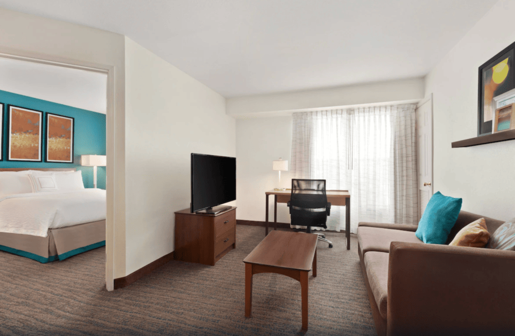 Sleeping and living areas in a staying room at Residence Inn by Marriott Las Vegas South, one of the best hotels near the Las Vegas Airport.