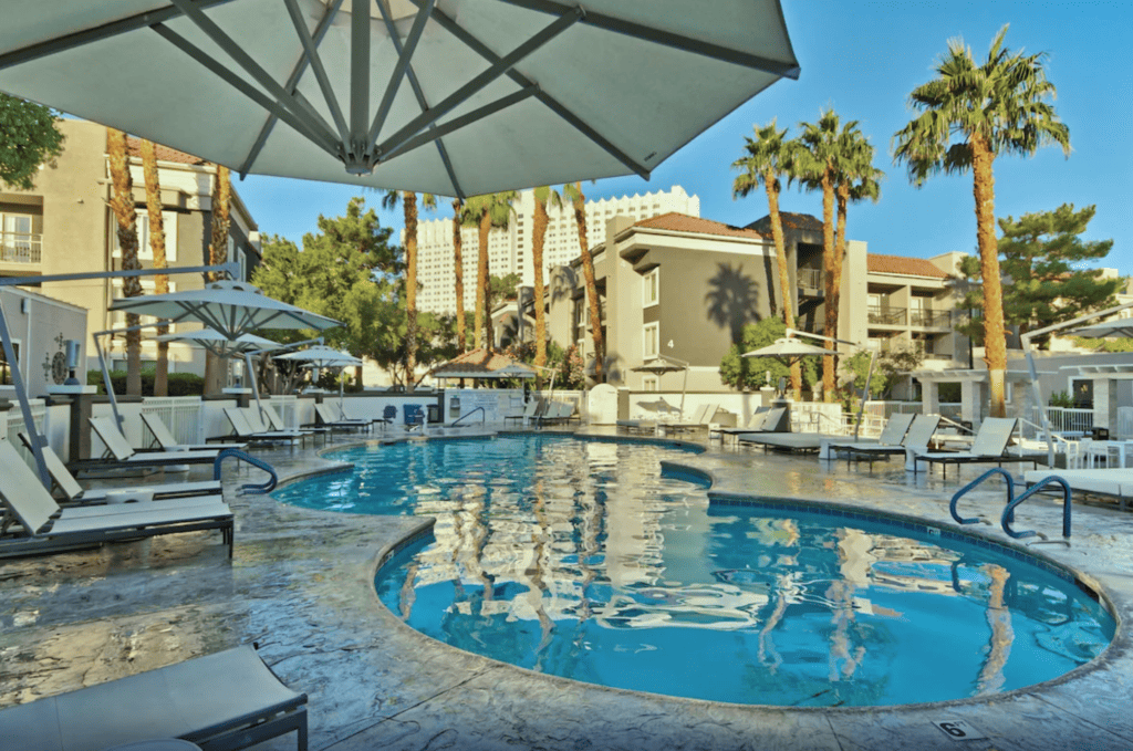 Swimming pool at Desert Rose Resort, one of the best hotels near the Las Vegas Airport.