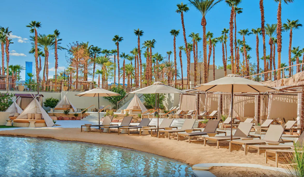 Outdoor pool and cabanas at Virgin Hotels Las Vegas, one of the best hotels near the Las Vegas Airport.
