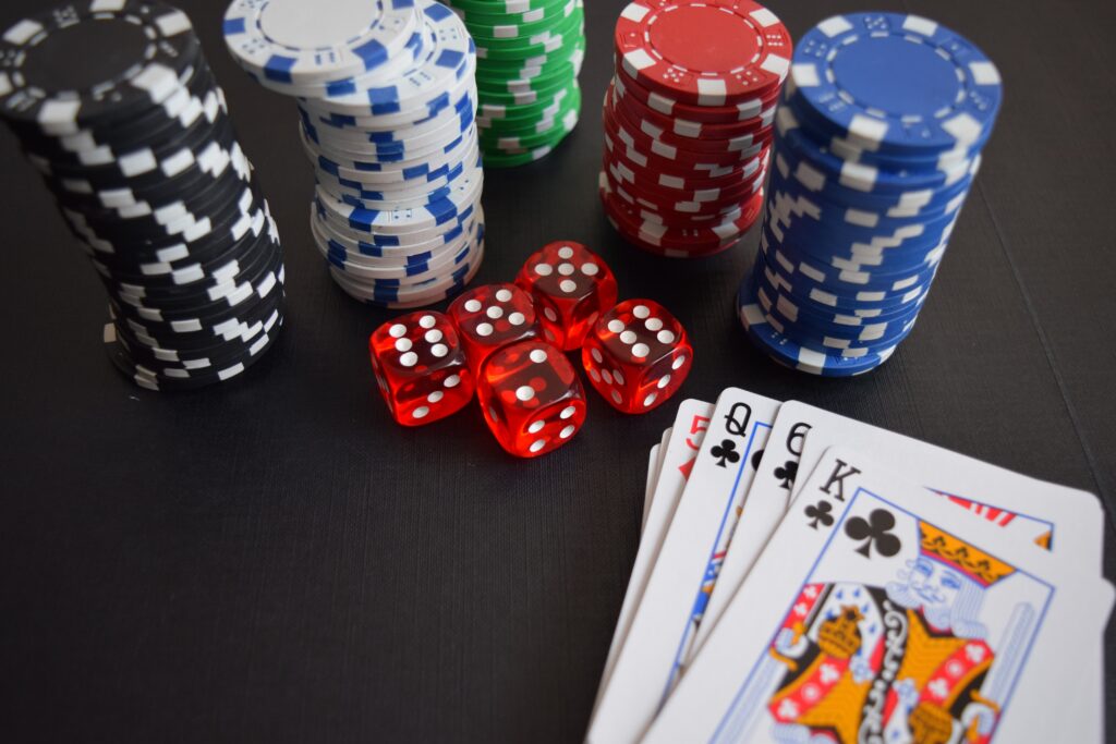 Poker chips, cards, and dice