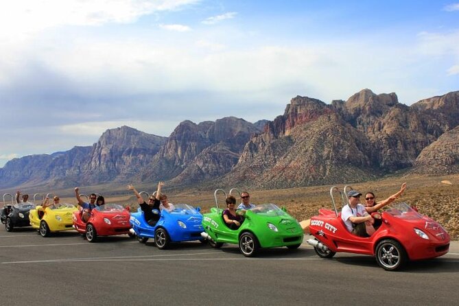 Scooter cars driving through Red Rock Canyon