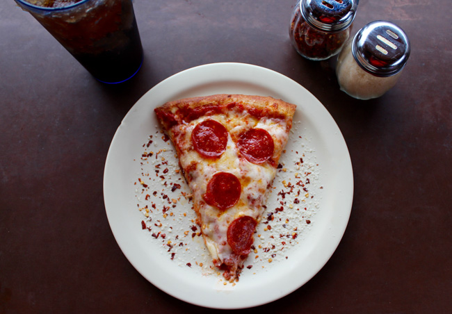 A slice of pizza from Deli in the Pines.