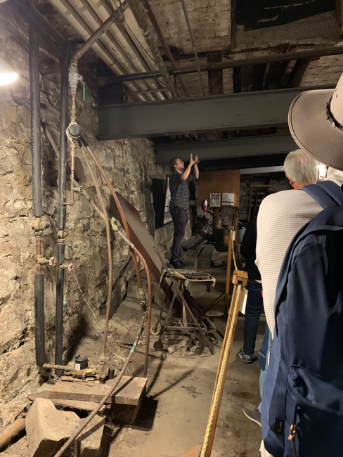 Tour guide speaking in an Underground Tour in Seattle