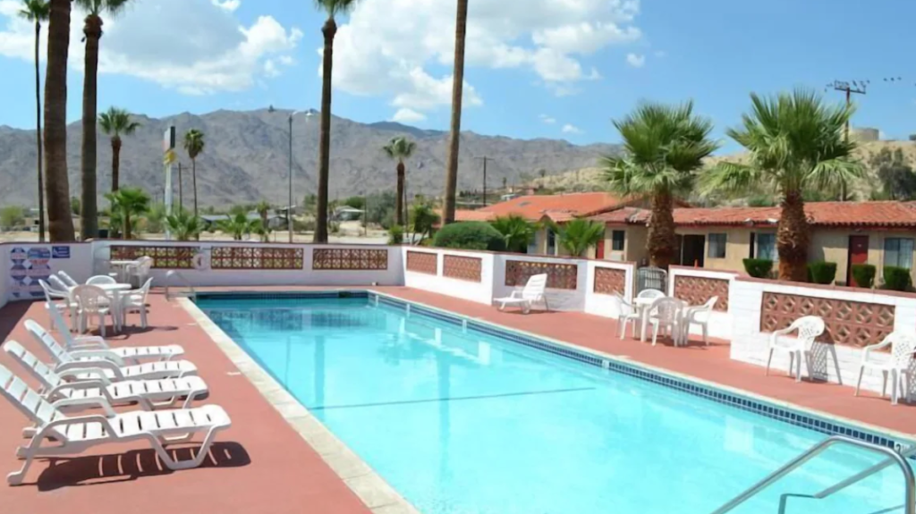 Outdoor swimming pool at El Rancho Dolores Motel at Joshua Tree National Park, one of the best places to stay when visiting Joshua Tree in December.
