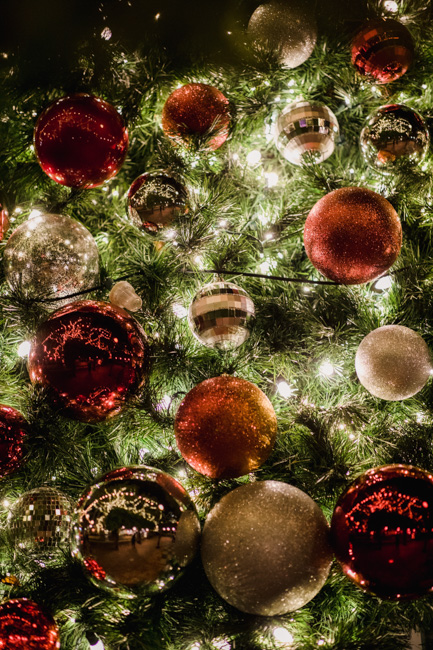Close-up of a decorated tree onboard a Christmas Ship Cruise, one of the most fun things to do when in Seattle in December.