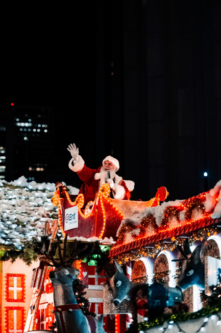 Santa on a Snowflake Lane parade float.