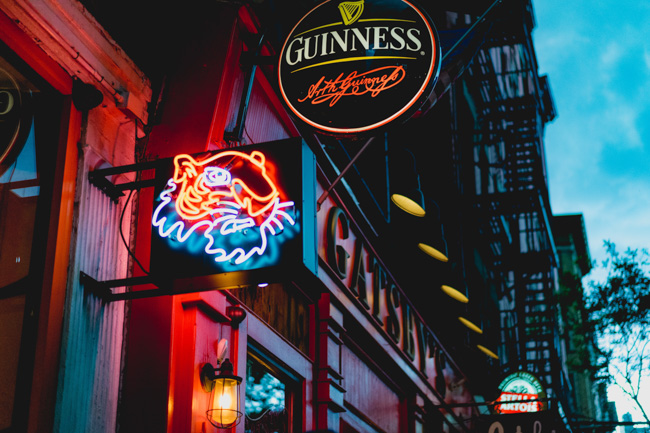 Neon signs outside a bar in Seattle in December.