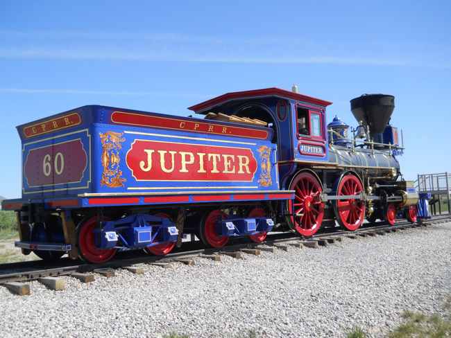 A colorful train on railroad tracks at Golden Spike National Historical Park in Utah.
