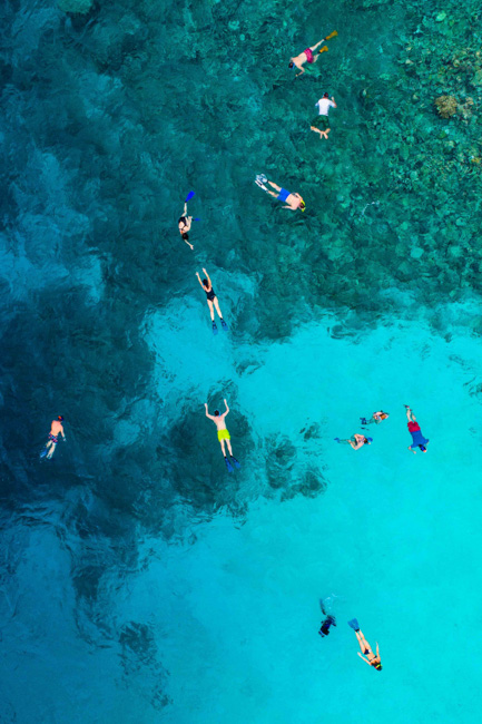 People snorkeling near Flamenco Beach.