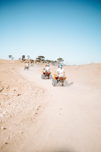 A parade of ATVs on one of the Las Vegas ATV Tours.