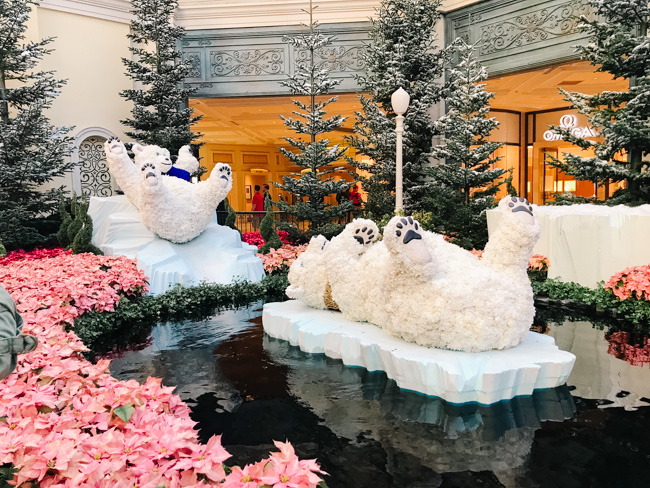 Polar bears in a mall holiday display.