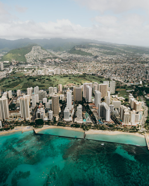 Buildings along the coastline in Oahu in January.