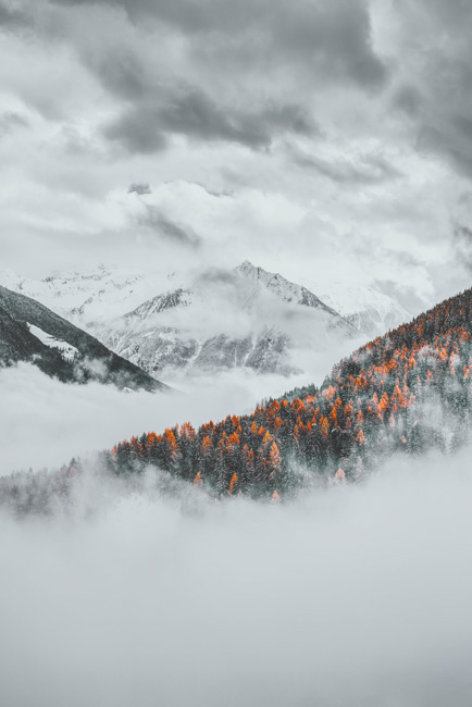 A snowy and colorful mountainside in Yosemite National Park.