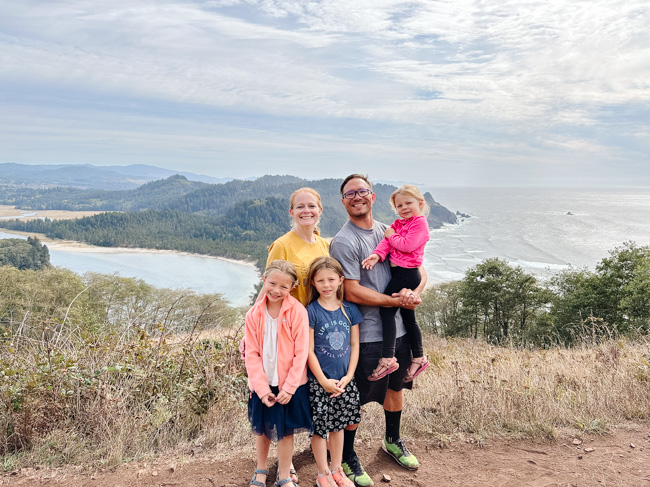 A family hiking Cascade Head