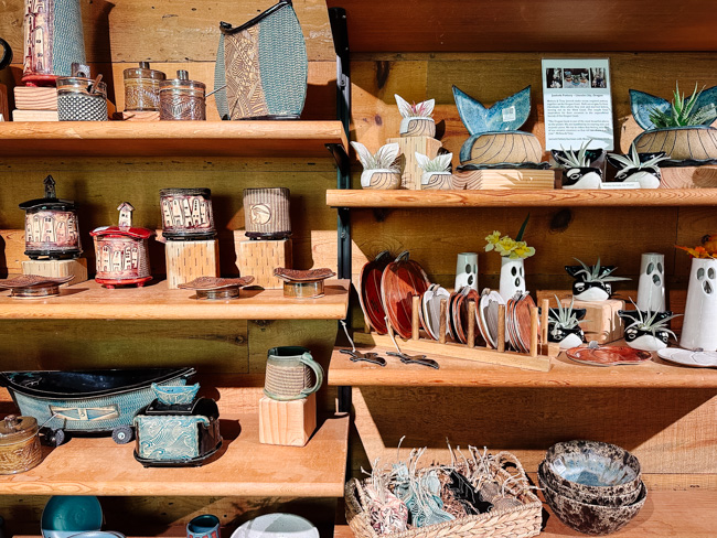 Product displays at Mossy Creek Pottery. Searching for souvenirs here is one of the most fun things to do in Lincoln City.