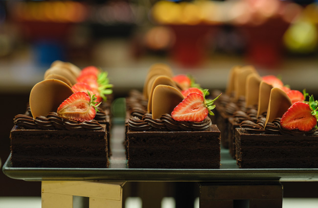 Chocolate covered strawberries on display.