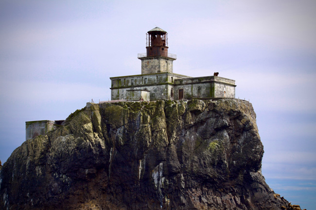 Catching a glimpse of the Tillamook Rock Lighthouse is one of best things to do in Cannon Beach.
