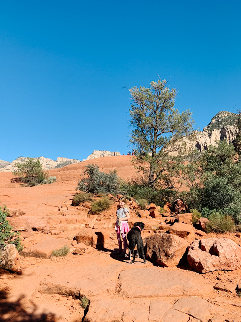 My daughter hiking the Broken Arrow Trail with our dog